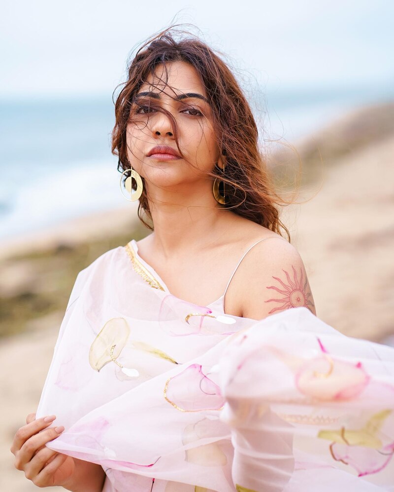 Madonna sebastian new hot saree clicks